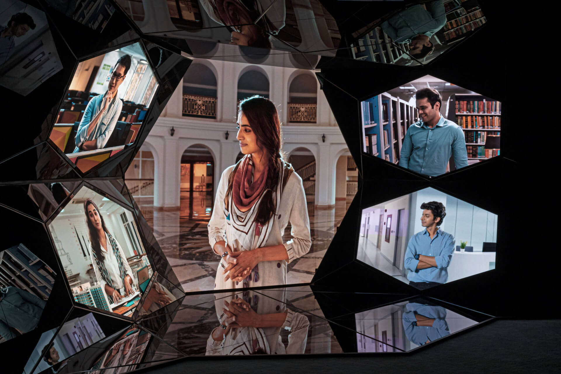 Four people on a Kaleidoscope. Manipal University Experience Center